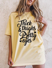 Load image into Gallery viewer, Thick thighs and pretty eyes Tee Shirt
